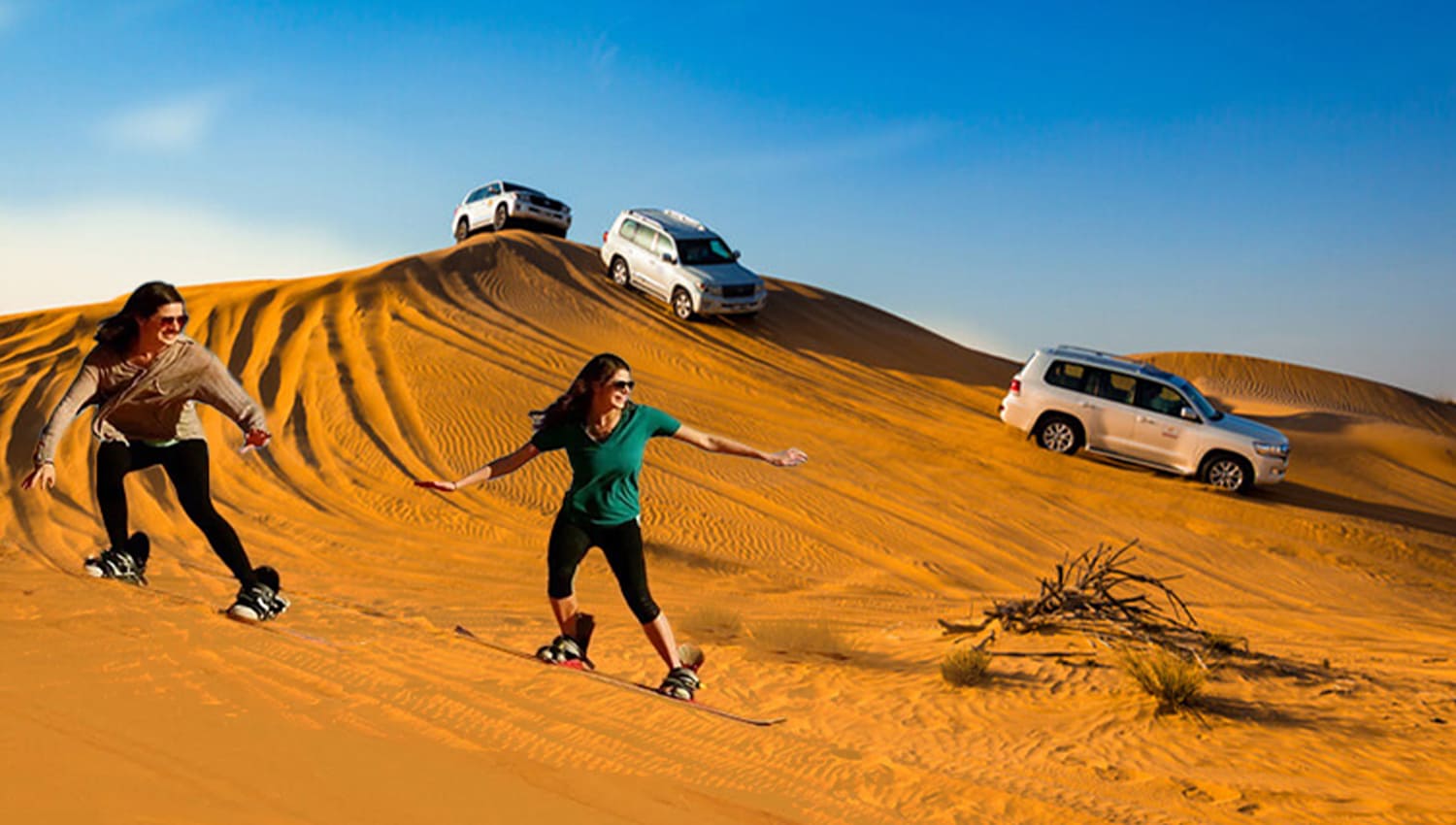 Dune Buggy Dubai, A bird view of dune buggy while dune bashing in the red dunes of dubai.